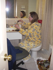 The bathroom, it's not just for pooping any more.
Deb tying flies at 4:30 AM.