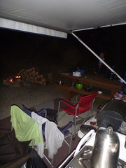 Night shot of camp with the fire going
