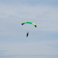 Gliding to earth safely after opening the parachute following 5000 foot or so free fall