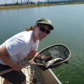 Lisa with a nice bow on a beautiful day caught in the shallows