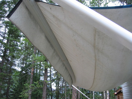 THIS is why you angle the awning - they're not designed to hold 500lbs of rainwater!