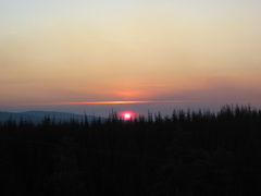 Red sunset due to the forest fires in the area