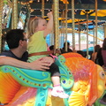 RM enjoying her first ride on the King Arthur Carrousel