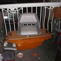 Metzler storage/swivel seat/rod holders. Can hold batteries and or gas tank.
