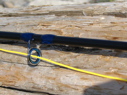 Close up of a blue ceramic stripping guide with blue thread without C/P 