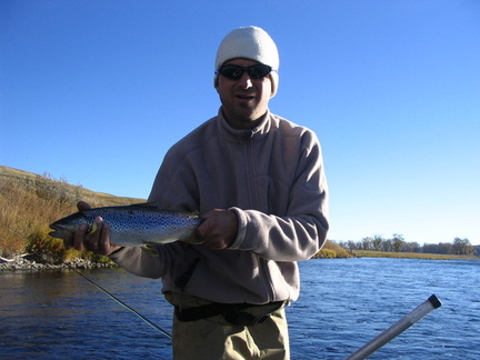My buddy Mike Algar from Freestone Flyfishers with a nice Bow River brown trout.