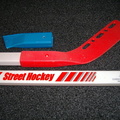 Broken children's toy street hockey sticks &quot;before&quot;.