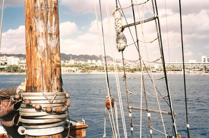 Looking towards Eilat from a square rigger boat anchored in the Red Sea.