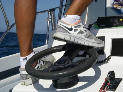 There is a novel way to get a better view. Stand on the steering console and steer with your foot.