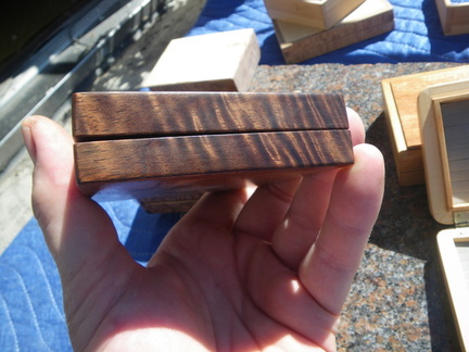 detail view of the figured walnut in the applewood and walnut shirt pocket box