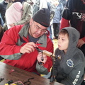 Rob (Aquarsonist) guides a youngster tying a fly