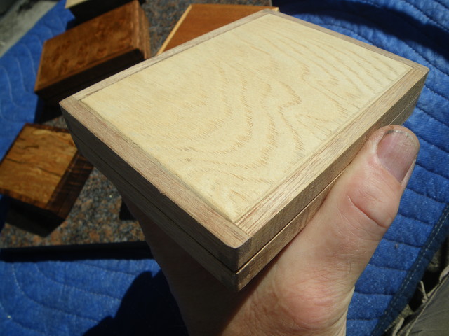 detailed view of an unfinished Japanese ash and honduran mahogany box with finger jointed corners